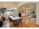Elegant dining room showcasing an open floor plan, modern chandelier, and contemporary decor at 14910 Williams St, Thornton, CO 80602