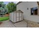 A convenient storage shed located in the backyard, providing extra space for tools and equipment at 14910 Williams St, Thornton, CO 80602
