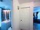 Hallway showing the entry to the bathroom and living room at 413 Jamaica St, Aurora, CO 80010
