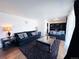 Comfortable living room with two sofas, a coffee table, and views into the next room at 413 Jamaica St, Aurora, CO 80010