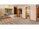 Bedroom with a view, built in bookcase, and door that enters into the walk in closet at 9299 William Cody Dr, Evergreen, CO 80439