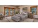 Serene main bedroom with balcony access and generous natural light at 9299 William Cody Dr, Evergreen, CO 80439