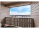 Balcony with a view of neighboring homes under a bright sky, offering a glimpse of community living at 9318 Las Ramblas Ct # R, Parker, CO 80134