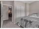 Cozy bedroom featuring a large closet, gray walls and carpet at 9318 Las Ramblas Ct # R, Parker, CO 80134