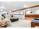 Cozy basement area with comfortable seating and entertainment at 15020 Harrison St, Brighton, CO 80602