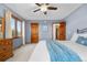 Bedroom with hardwood trim and comfortable furnishings at 15020 Harrison St, Brighton, CO 80602