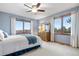 Comfortable bedroom with natural light and a pleasant neighborhood view at 15020 Harrison St, Brighton, CO 80602