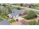 Aerial view of home showing roof, landscaping, and outbuildings at 15020 Harrison St, Brighton, CO 80602