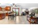 Open living area combining kitchen, dining, and living spaces with seamless flow and natural light at 15020 Harrison St, Brighton, CO 80602
