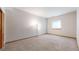 Spacious bedroom features plush carpeting, ample natural light, and a neutral color palette at 9559 Brook Hill Ln, Lone Tree, CO 80124