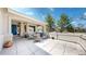 Inviting covered porch with comfortable seating, perfect for enjoying the outdoors at 9559 Brook Hill Ln, Lone Tree, CO 80124
