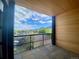 Inviting balcony with wood ceiling and a stunning view of the mountains and city skyline at 2718 Pine St # 305, Boulder, CO 80302