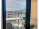 Views from balcony of nearby town and the mountains in the distance at 2718 Pine St # 305, Boulder, CO 80302