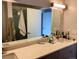 Bathroom with double vanity, large mirror, and updated shower at 2718 Pine St # 305, Boulder, CO 80302