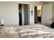 Spacious bedroom with closet and views into kitchen at 2718 Pine St # 305, Boulder, CO 80302
