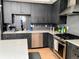 Contemporary kitchen featuring stainless steel appliances and gray cabinetry at 2718 Pine St # 305, Boulder, CO 80302