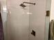 Updated shower with white tiled walls and modern fixtures at 2718 Pine St # 305, Boulder, CO 80302