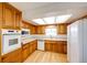 Bright kitchen with wooden cabinets and appliances at 9241 Knox Ct, Westminster, CO 80031