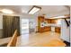 Bright kitchen with wooden cabinets and stainless steel appliances at 9241 Knox Ct, Westminster, CO 80031