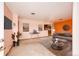 Bright, staged living room with neutral tones and open layout at 9241 Knox Ct, Westminster, CO 80031