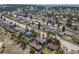 Expansive aerial view of a charming neighborhood nestled among lush pine trees and rolling hills at 576 S Tabor St, Elizabeth, CO 80107