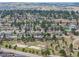 Panoramic aerial shot revealing a quaint community with tree-lined streets and open green spaces at 576 S Tabor St, Elizabeth, CO 80107