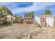 Backyard area with fencing and a shed, providing privacy and outdoor storage solutions at 576 S Tabor St, Elizabeth, CO 80107