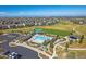 Aerial view of community pool, recreational areas, and surrounding homes at 22537 E Swallow Pl, Aurora, CO 80016