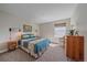 Charming bedroom with window seat and mid-century dresser at 22537 E Swallow Pl, Aurora, CO 80016