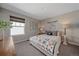 Cozy bedroom with a comfortable bed and charming wall decor at 22537 E Swallow Pl, Aurora, CO 80016