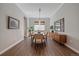 Modern dining room with hardwood floors and mid-century furniture at 22537 E Swallow Pl, Aurora, CO 80016