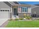 House exterior showcasing front entrance and landscaping at 22537 E Swallow Pl, Aurora, CO 80016