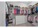 Spacious walk-in closet with ample shelving and hanging space at 22537 E Swallow Pl, Aurora, CO 80016