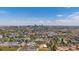 Expansive aerial view featuring the Denver skyline, stadium, and cityscape sprawling into the horizon at 1372 Lowell Blvd # 4, Denver, CO 80204