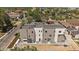 New construction modern townhomes with gray and white exteriors, and a view of the city skyline at 1372 Lowell Blvd # 4, Denver, CO 80204