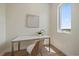 Home office space with natural light, featuring light walls and wood floors at 1372 Lowell Blvd # 4, Denver, CO 80204