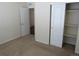 Bedroom with closet space and neutral walls, offering a blank canvas to personalize at 3212 S Kirk Way, Aurora, CO 80013