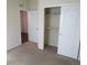 Bedroom with a closet and neutral walls, offering a blank canvas to personalize at 3212 S Kirk Way, Aurora, CO 80013