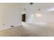 Spacious finished basement with neutral carpet and a large closet for storage at 16293 E Brown Pl, Aurora, CO 80013