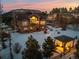 Aerial view of house with gazebo and backyard at dusk in winter at 1535 Plowman Dr, Monument, CO 80132