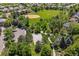 Overhead shot of the neighborhood park showing the playground and basketball court at 11969 E Lake Cir, Greenwood Village, CO 80111