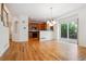 Dining area that connects to the kitchen with sliding doors to the outside at 11969 E Lake Cir, Greenwood Village, CO 80111
