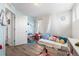 Charming bedroom showcases colorful decor, soft rugs, and plenty of room for play at 4405 Walden Ct, Denver, CO 80249