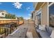 Outdoor deck featuring comfortable seating, a fire pit, and a grill, perfect for relaxation and entertaining at 4405 Walden Ct, Denver, CO 80249