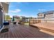 Large deck with outdoor seating, grill, and views of the backyard at 4405 Walden Ct, Denver, CO 80249