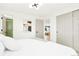 Bright bedroom with ample closet space and views into the attached bathroom and common areas at 4320 Lamar St, Wheat Ridge, CO 80033