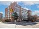 Brick apartment building on a corner lot with street parking at 1196 N Grant St # 405, Denver, CO 80203