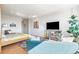Comfortable living and sleeping area with contemporary furniture and colorful artwork at 1196 N Grant St # 405, Denver, CO 80203