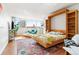 Combined living and sleeping area featuring stylish decor, comfortable furniture, and natural light at 1196 N Grant St # 405, Denver, CO 80203
