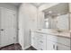 Bathroom features double sinks, quartz countertop and white cabinets at 2177 Flower Blossom Ave, Brighton, CO 80601